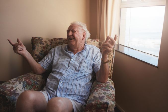 Older man relaxing at nursing home