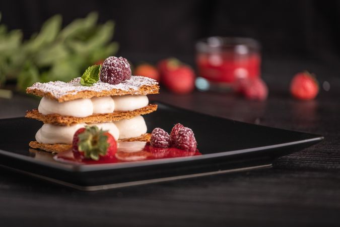 Diphlomate cream and red fruit strudel in elegant plate