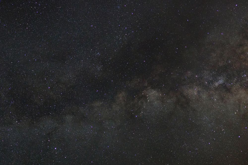 Starry night sky and milky way galaxy with stars and space dust in the universe