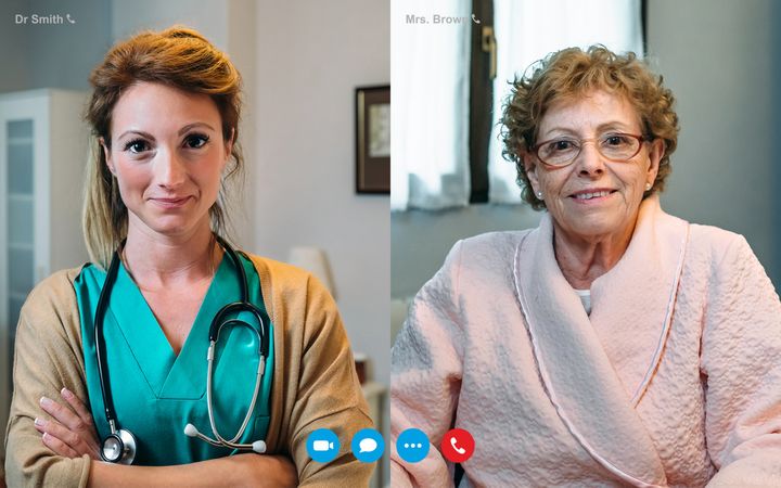 Video call screen with older woman and female doctor