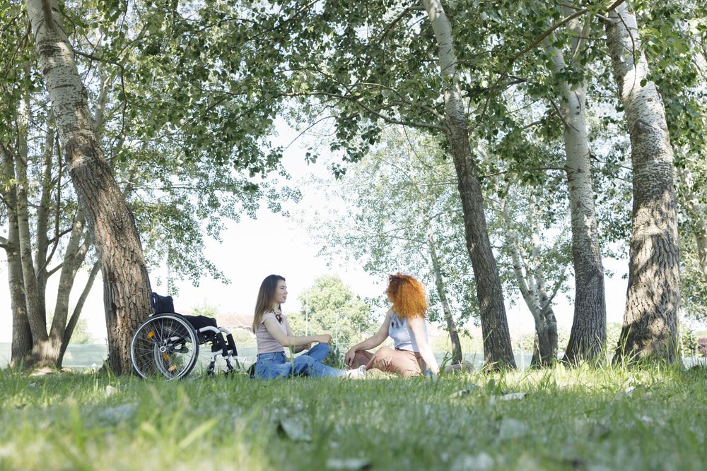 Two women having a picnic in the park