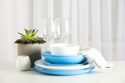 Cutlery with succulent plant stacked on table, space for text