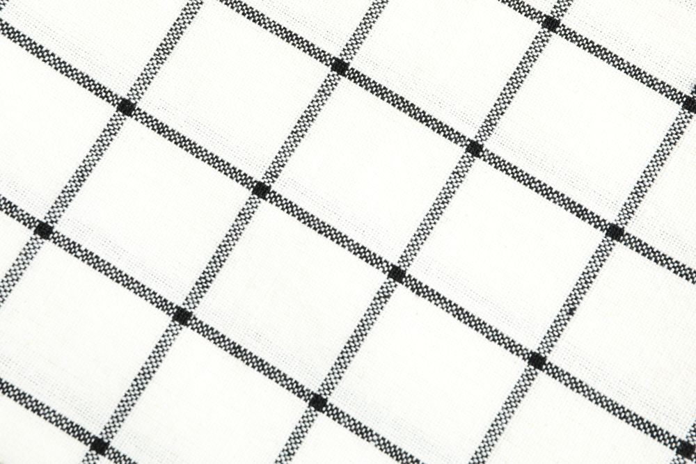 Folded fabric napkin as background, space for text