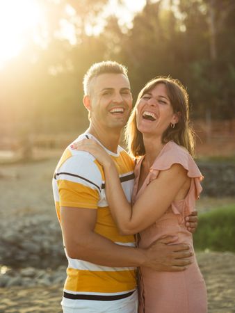 Couple looking al camera with happy smile