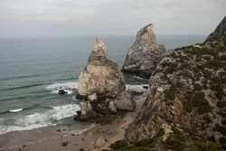Coastal cliffs and wavy ocean