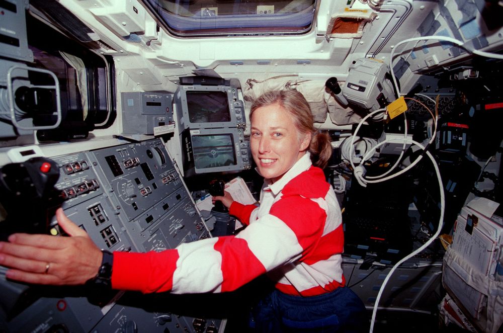 Astronaut N. Jan Davis pictured at work station for Remote Manipulator System