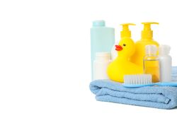 Baby hygiene accessories isolated on light background