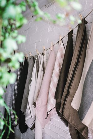 dish cloths hanging on twist with pins