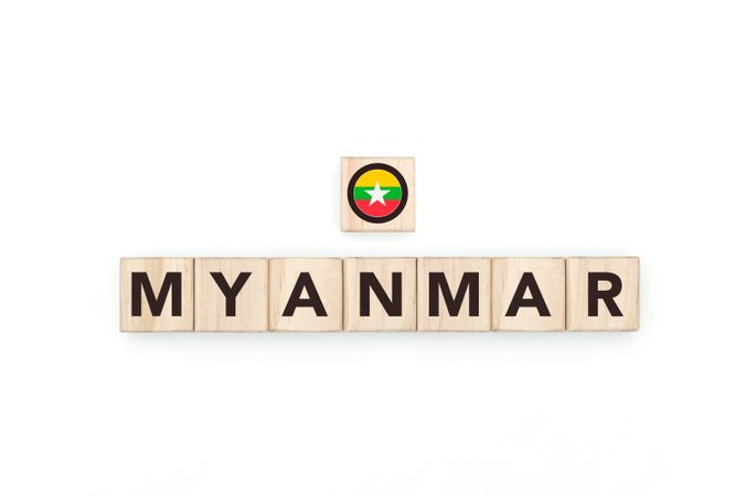 Wooden blocks bearing the name and flag of Myanmar.