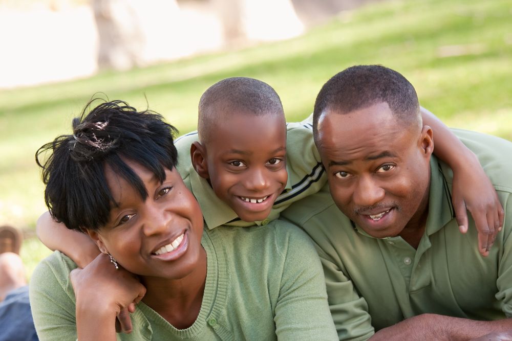 Portrait of Smiling Black Family in the Park