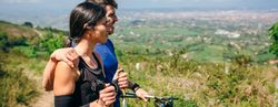 Couple stopping to look the views while doing trail