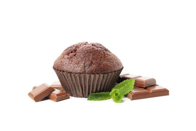 Delicious chocolate and muffin isolated on plain background