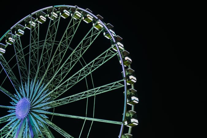 Illuminated rides in amusement park