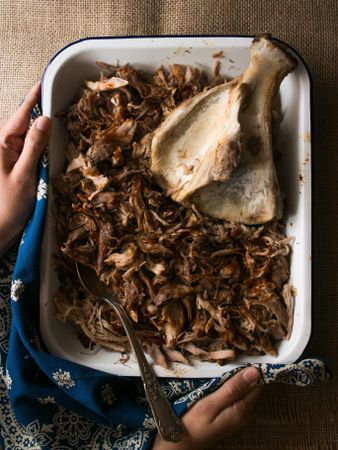 Container with puller pork and bone