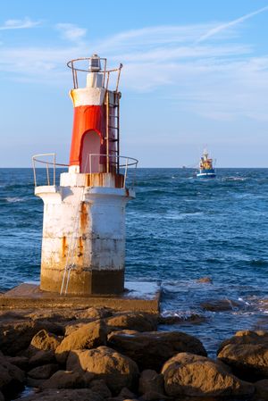 Lighthouse on rocky coastline