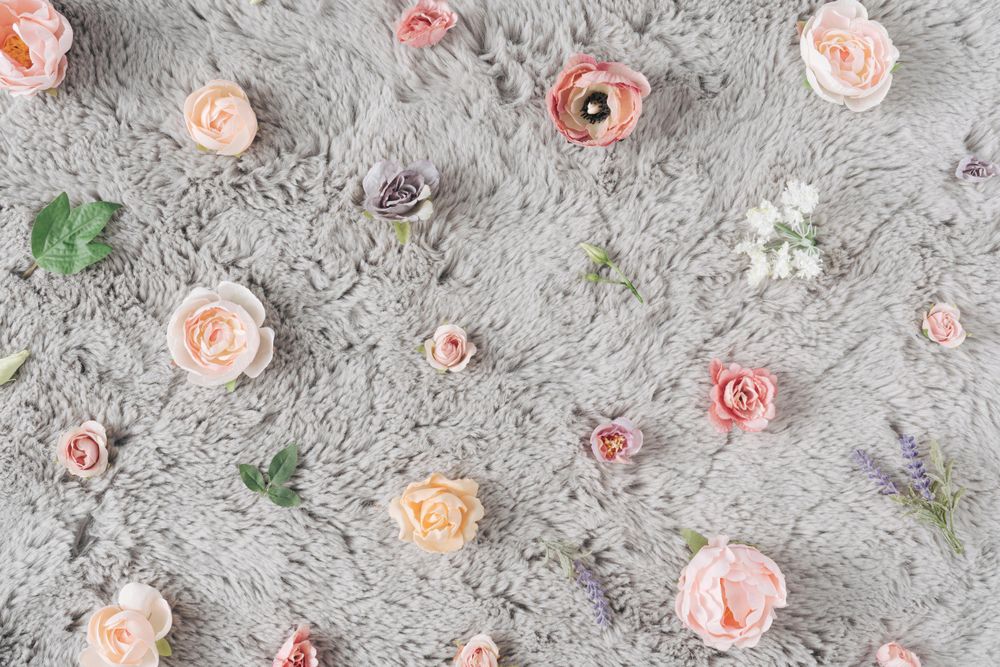 Pattern of flowers on grey carpet
