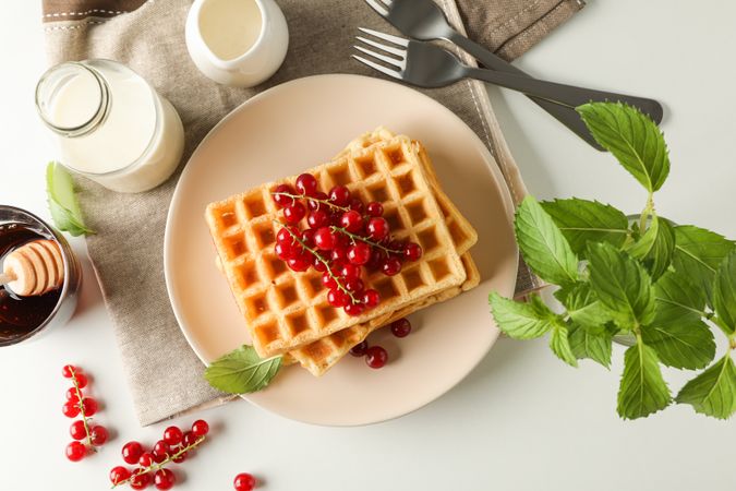 Beautiful composition with sweet belgian waffles, top view