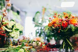 Floral bouquet standing on the counter in flower shop.