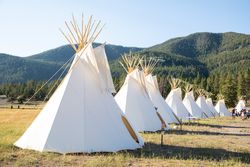 Montana, United States - August 17, 2022: Line of teepee in the rockies in summer 5o7A95