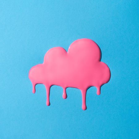 Melting pink cloud on blue background