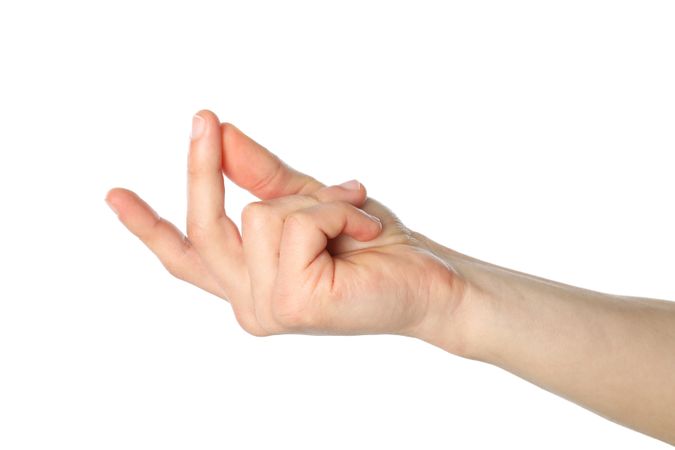 Male hand showing gesture, isolated on plain background
