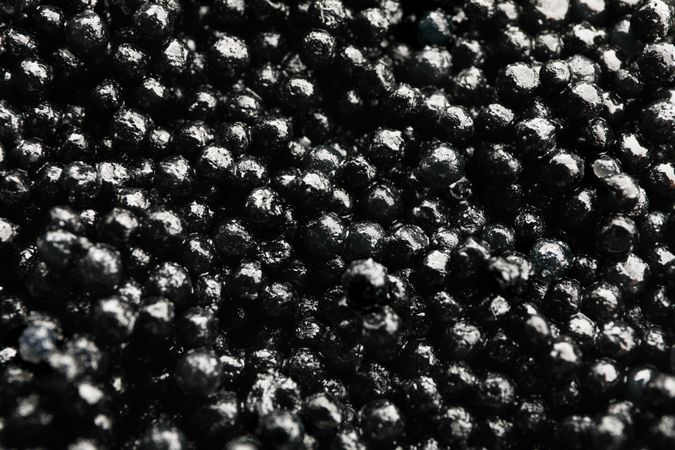 Delicious caviar as background, close up