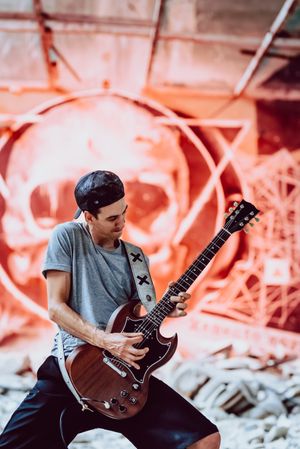 Musician playing electric guitar