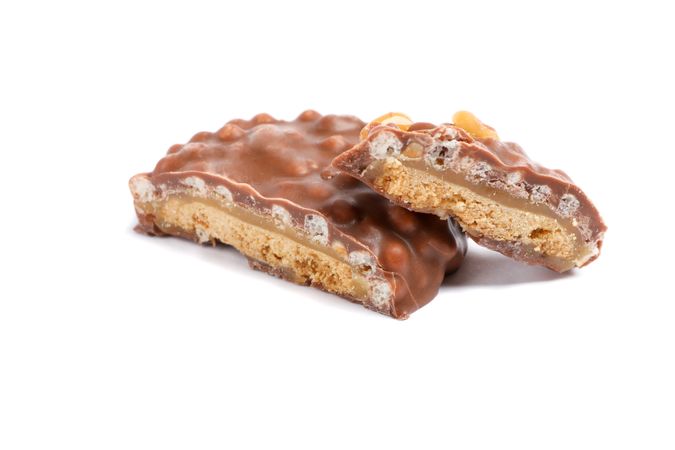 Chocolate cookies with caramel filling isolated on plain background
