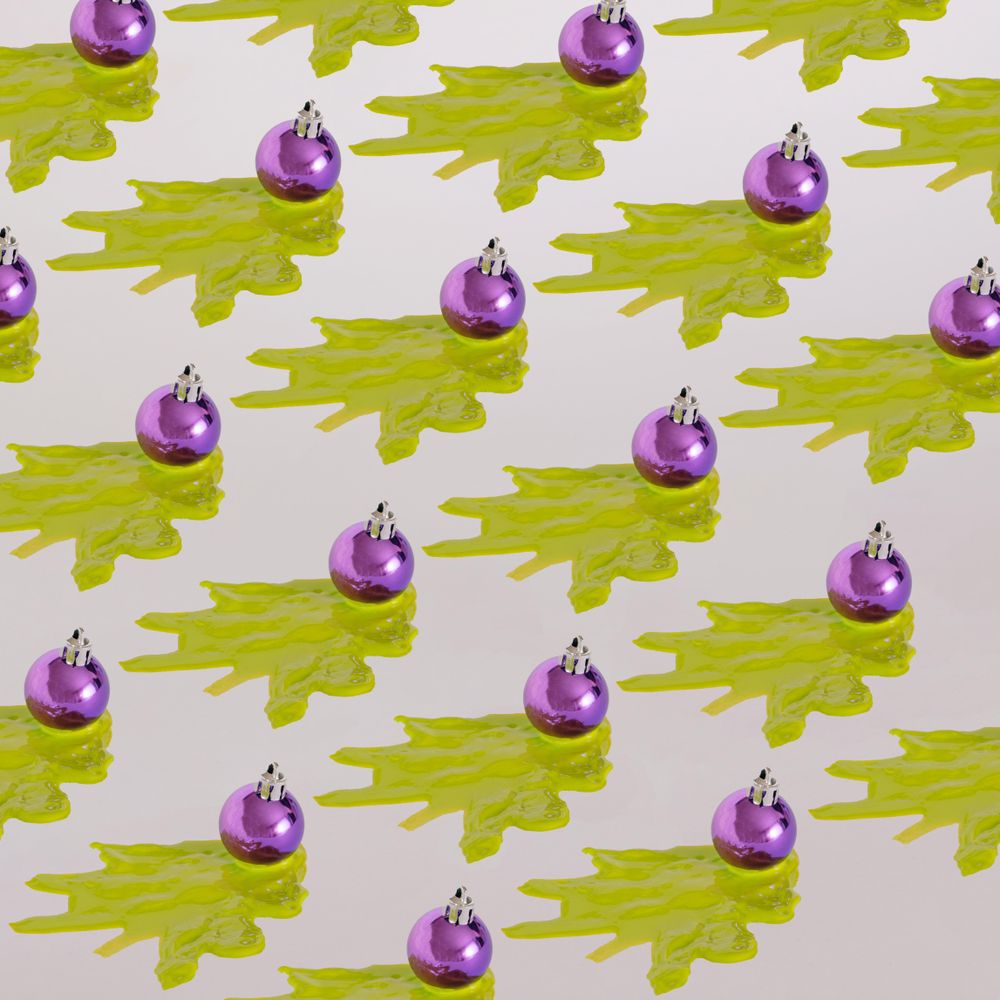 Pattern of purple Christmas decoration with green abstract tree
