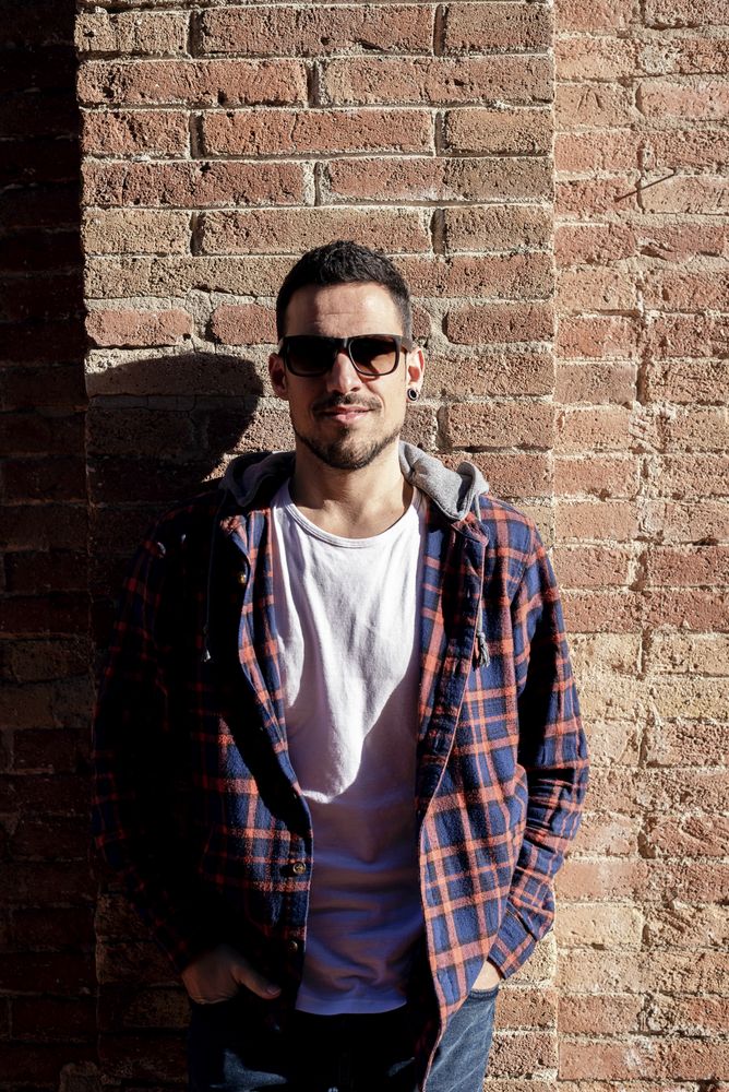 Portrait of relaxed casual man with sunglasses