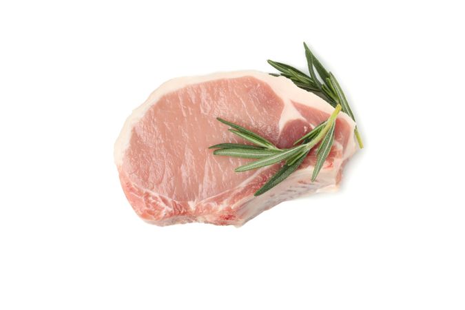 Raw meat for steak isolated on light background