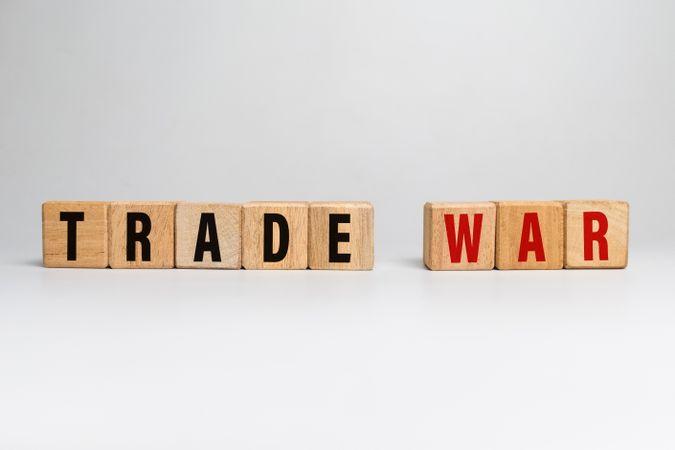 trade war word text on wooden blocks isolated on plain background
