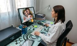 Woman talking on video call with her mother
