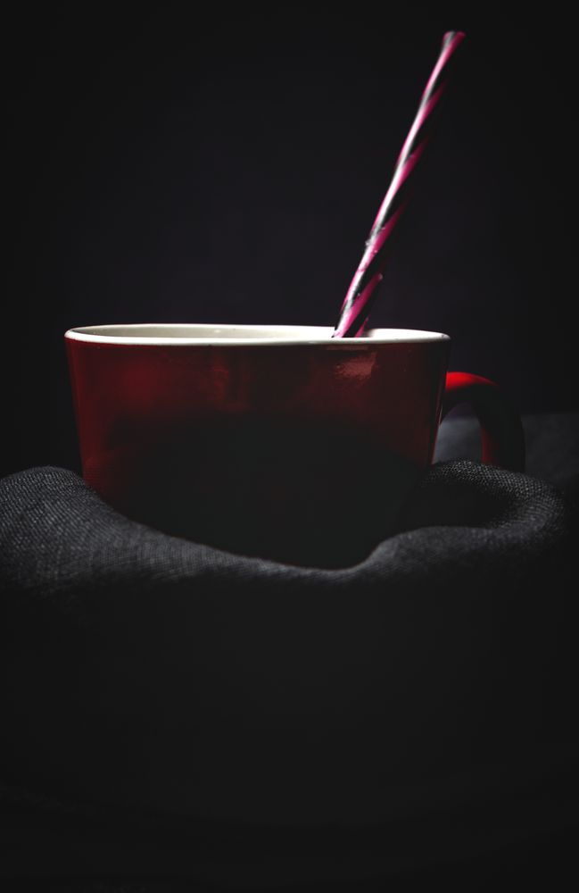 Cup of milk on table