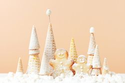 Neutral scene of gingerbread cookies and waffle pine trees