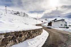 Road going through ski resort in the Sierra Nevada mountains