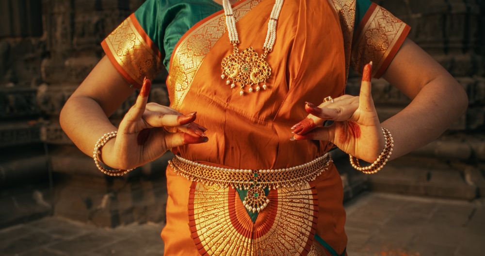 Close Up Shot on the Hands of an Indian Female Dancer Doing Symbolic Gesture, Conveying Different Messages in Folkloric Dance.