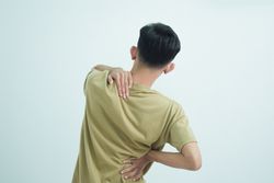 Asian young man feeling pain on his body