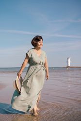 Woman gazing at sea horizon
