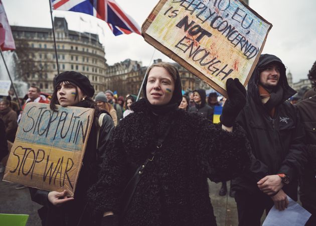 London, England, United Kingdom - March 5 2022: Young women with signs protesting the war in Ukraine