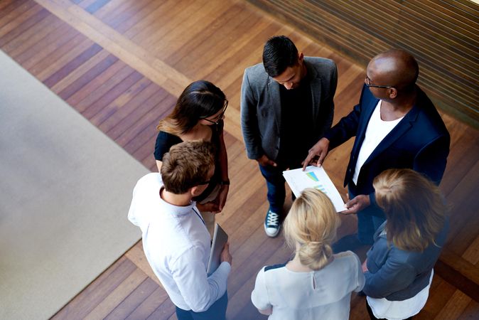 Top view of colleagues in a huddle