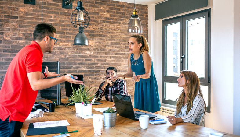 Coworkers arguing in the office