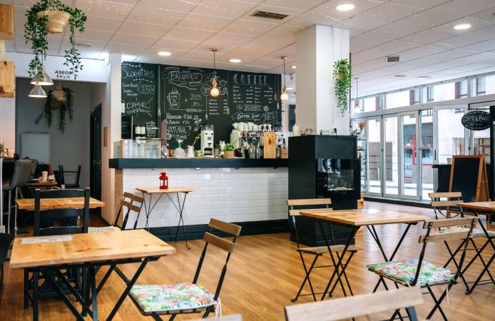 Empty cafe interior with chairs and tables