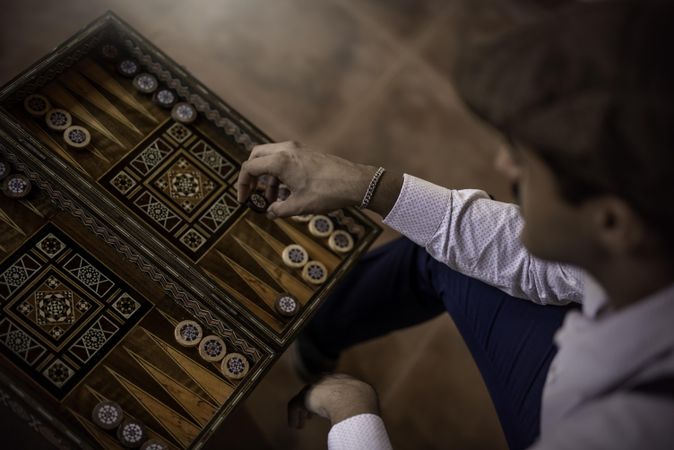 Man playing backgammon