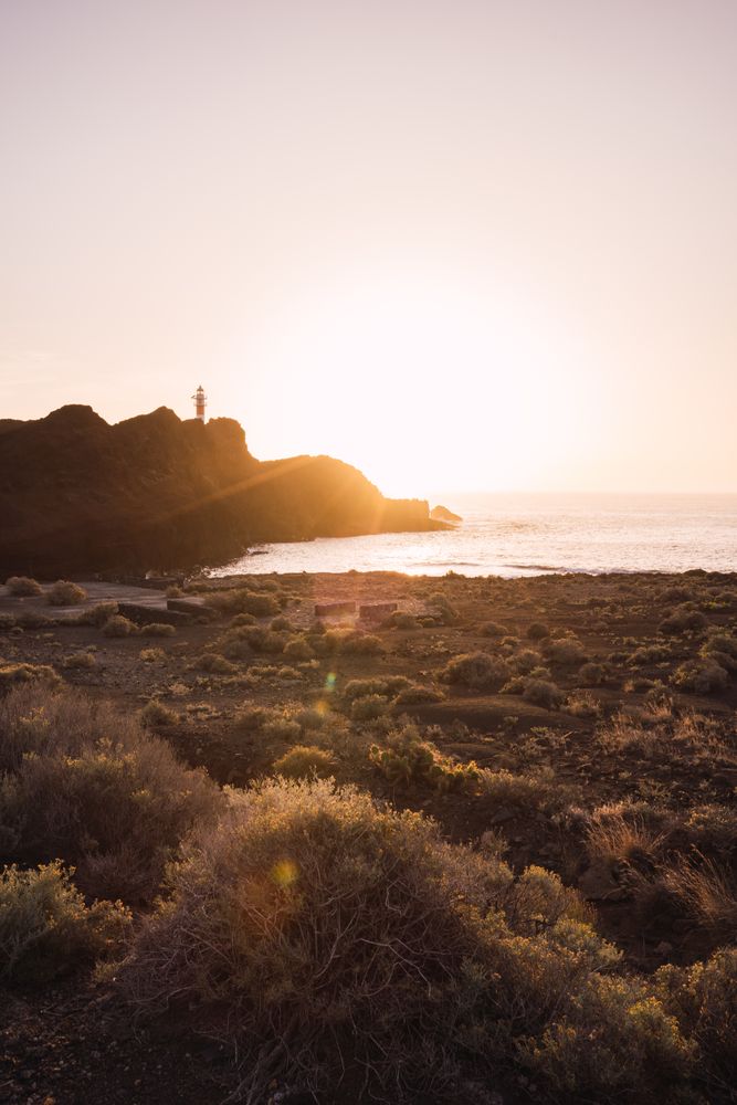 Rocky coastline at bright sunset