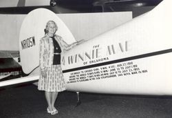 Aviator Fay Wells with the Winnie Mae Fay Gillis airplane 4d9yNb