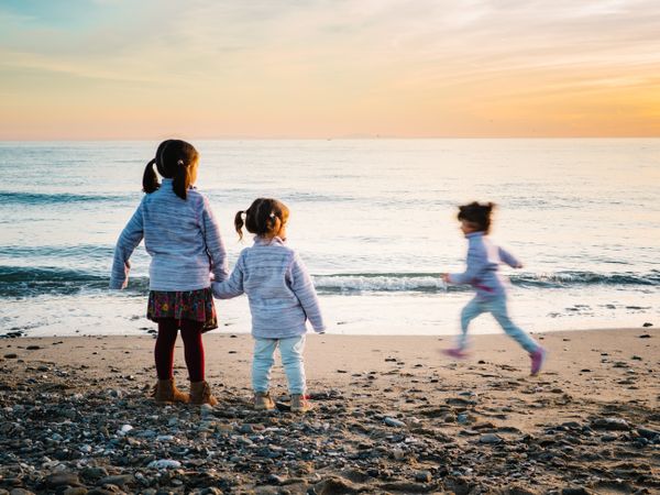 kids playing at the beach
