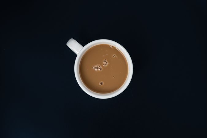 Flat lay of a ceramc cup of coffee