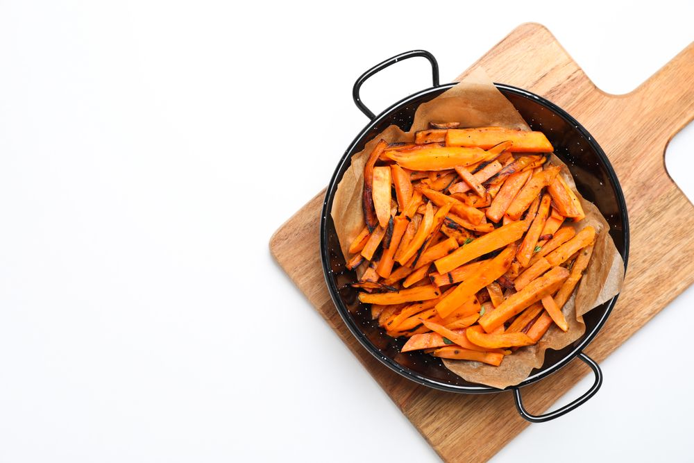 Concept of tasty food - sweet potato fries