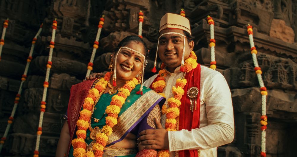 Authentic Portrait of an Indian Man in Traditional Attire Playing Instruments and Chanting in an Ancient Hindu Temple.